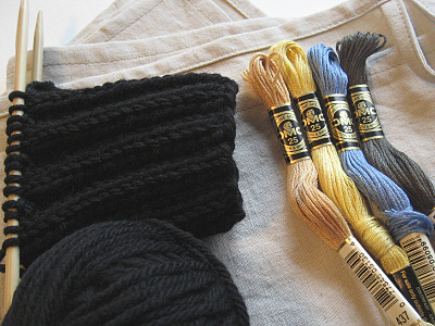linen tea towels and wool knit gloves